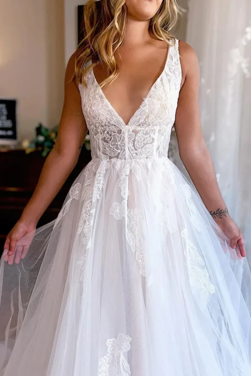 Ivory A-Line Deep V-Neck Backless Long Wedding Dress with Lace