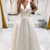 Ivory A-Line Deep V-Neck Long Wedding Dress with Bowknot